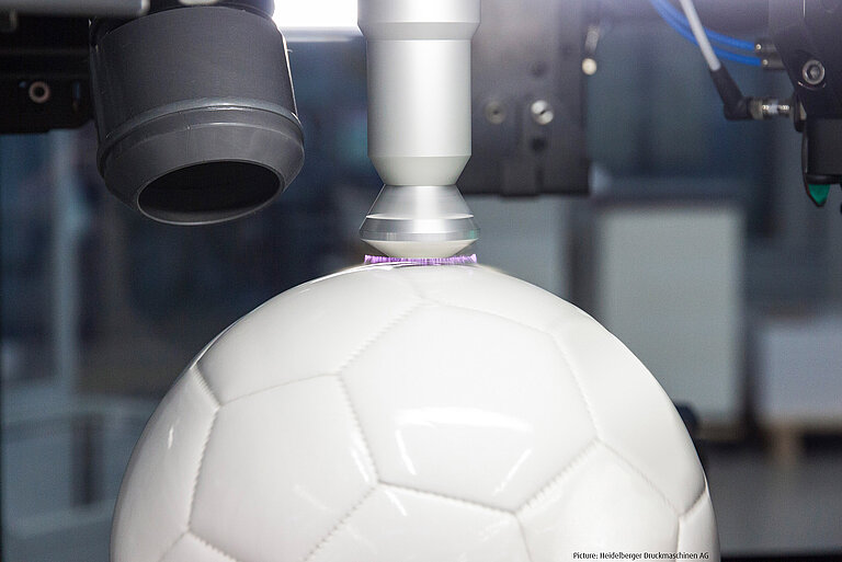 Plasma treatment of a soccer ball before digital printing